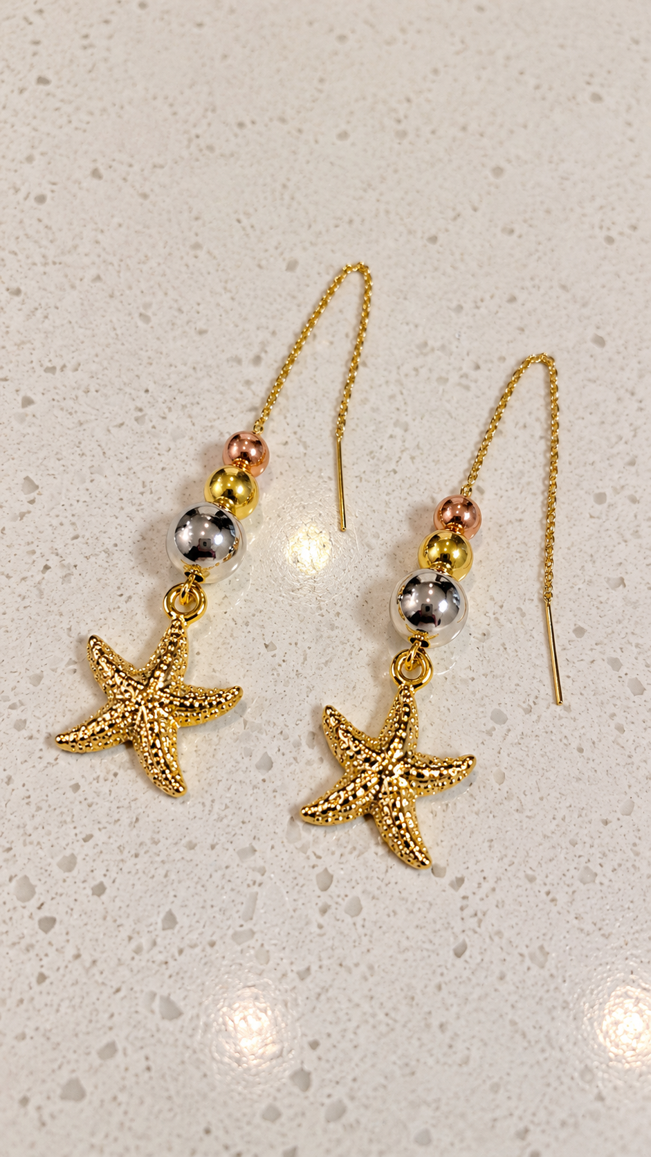 Pieza 7 Aretes estrella de mar tricolor